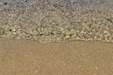 Wave hitting the beach