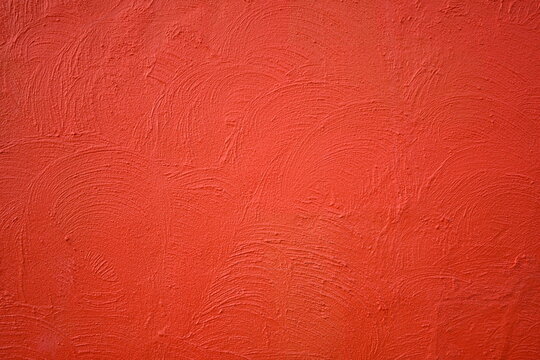 Texture red cement wall.