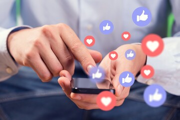 User holding phone with Social media.