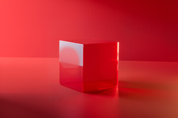 A minimalist photo of a red cube against a red background.