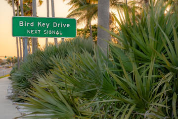 Photo of sign noting Bird Key Drive next signal on Bird Key Sarasota Florida USA
