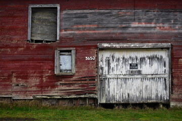 3650 numbers on side of old red barn.