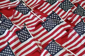 Fototapeta premium Patriotic Independence Day Celebration with Vibrant American Flags and Symbolic Decorations