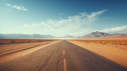 Fototapeta na wymiar Empty asphalt road in the desert. Long straight asphalt road leading to the desert