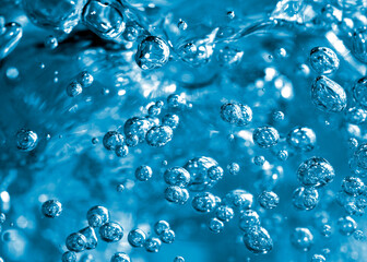 Captivating image showing the detailed beauty of water droplets in motion, highlighted with a...