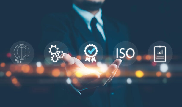ISO standards quality control, assurance and warranty business technology concept. Touching on screen with ISO and globe icons on smart background. ISO Standard certification. Modern ISO banner.