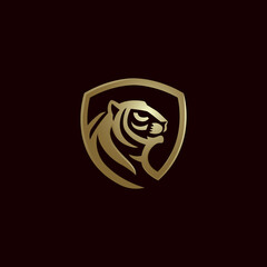 Tiger gold shield logo design vector icon illustration 