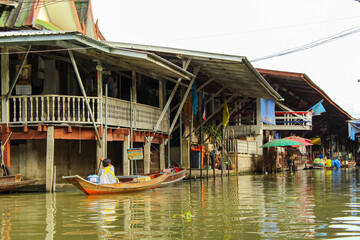 Fototapeta na wymiar Lao-tuk-luck Floating Market is a oldest floating market