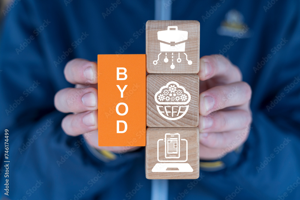 Aufkleber man holding blocks sees abbreviation: byod. byod bring your own device or distance remote learning c