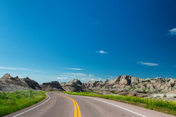 Embark on an awe-inspiring journey through the rugged beauty of Badlands National Park in South...