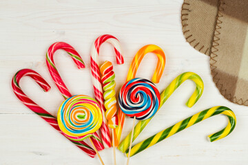 Colorful candy on wooden background