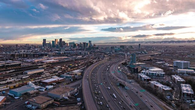 View of the city during sunset with clouds, aerial hyperlapse, Denver, Colorado, 4K