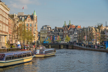 Fototapeta na wymiar Amsterdam Netherlands, city skyline at canal waterfront