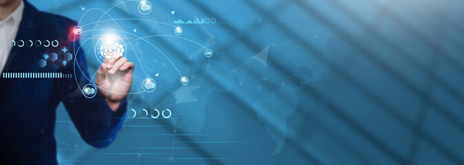 Finance Technology: Businessman Pointing with Finance Technology Icon and Technological Business Data Network. Financial Analysis, Fintech Innovation, Digital Transformation.