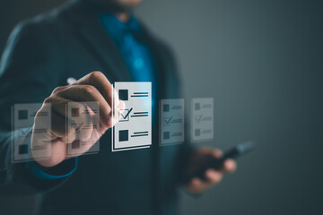 Business performance checklist, businessman doing online checklist survey, filling out digital form checklist, take an assessment, questionnaire, evaluation, online survey, online exam.