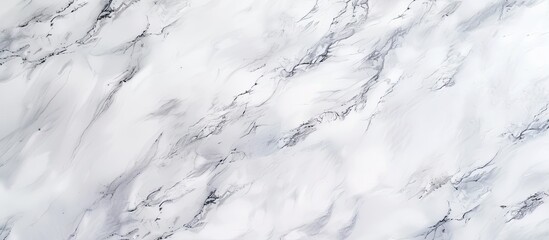 Fototapeta premium Detailed view of a white marble texture, showcasing the natural patterns and designs of the exquisite surface.