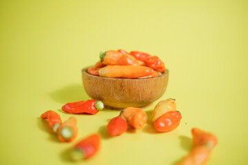 red chilies in a wooden bowl