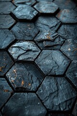 Detailed close-up view of a black stone floor, showcasing its texture and patterns.