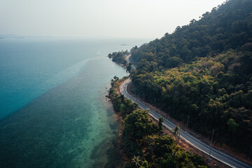 Aerial view  road along the sea,Seaside road approaching a beach seen from above