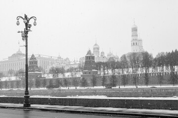 Winter view of the Moscow Kremlin during heavy snowfall. Black and white.