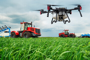 tractors cultivate the soil in rural areas. The concept of technological agriculture. Modern...