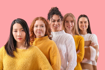 Beautiful young happy women on pink background. Women history month