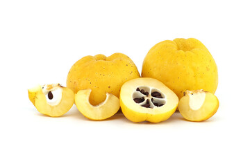 Vibrant quince fruits, both sliced and whole on white