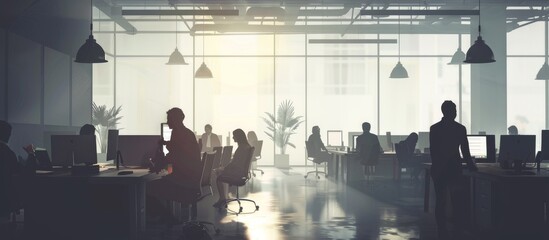 Modern workplace with people in silhouette background