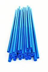 A bundle of vivid blue PVC pipes arranged in an organized pattern, isolated on a white background, suitable for industrial and construction concepts
