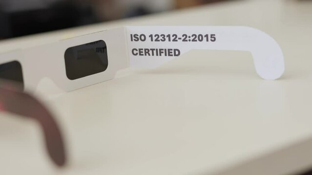 close up of certified solar eclipse glasses