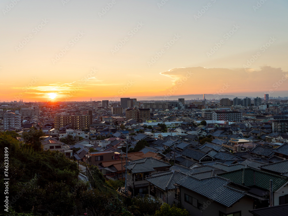 Sticker 夕日に照らされた大阪の都市景観