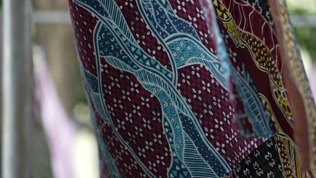 The batik cloth blows in the wind when hanging