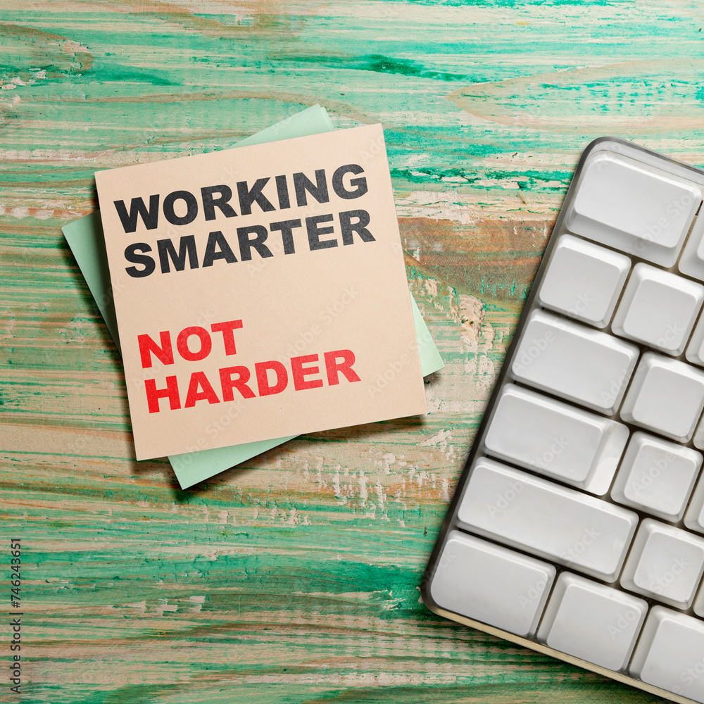 Poster stack of notepaper with 'working smarter, not harder' text