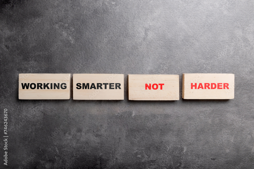 Poster the row of wooden blocks with 'working smarter not harder' text