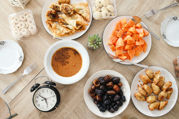 Iftar food on Ramadan month. Assorted festive traditional Indonesian dishes for breakfasting.