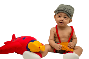 Happy and cute 6 months baby boy with red airplane toys