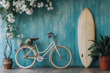 Küchenrückwand glas motiv Bicycle with Flowers and Surfboard Placed Near a Blue Wall in a Room © Emanuel