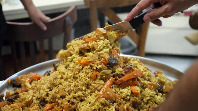 Typical Israeli Arabic mandy rice. Spicy Malabar Biryani.A mixed rice dish of basmati rice with meat and vegetable curry.