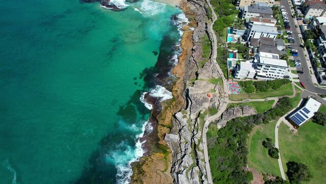 Ocean Waves Splashing Rocky Shore, Tamarama Beach And Bronte Beach In Sydney, NSW, Australia -Aerial Drone Shot