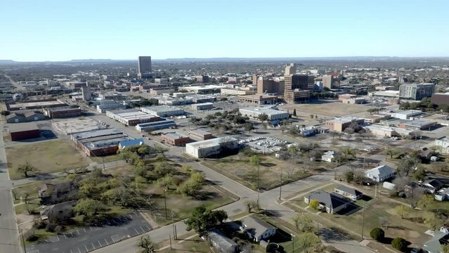 Downtown Abilene, Texas with drone video moving down wide shot.