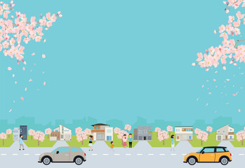 春の街並み　家と空と桜と車