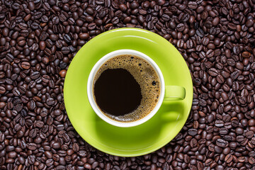 Coffee, coffee beans, coffee cup on table