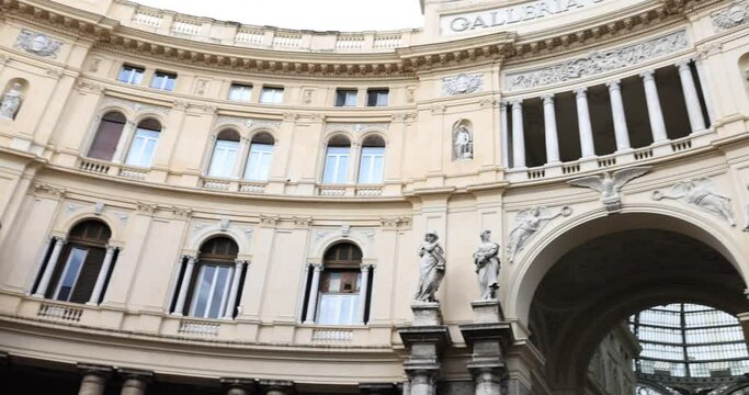 Panorama of architecture of Galleria Umberto I in European style with beautiful columns and balconies