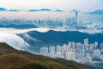 Skyline of Hong Kong city in fog - obrazy, fototapety, plakaty