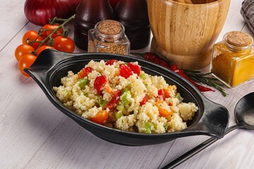 Vegan cuisine couscous with vegetables