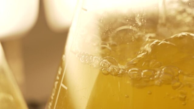 Science beaker bubbling cinematic chemicals