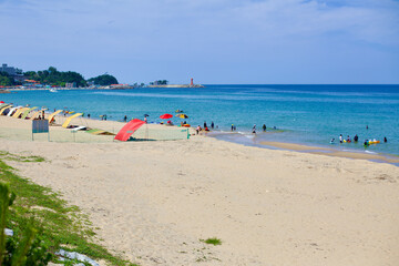 Fototapeta na wymiar Summer Day at Wonpo Village Beach