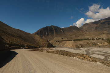 Fototapeta na wymiar Stunning road and landscape on the way to muktinath from jomsom in Mustang of Nepal