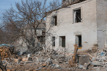 Consequences of a rocket explosion on a private house. War in Ukraine. Remains of a private house...