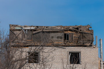 Consequences of a rocket explosion on a private house. War in Ukraine. Remains of a private house in the city of Dnipro. Consequences of shelling of peaceful Ukrainian cities by the Russian army.